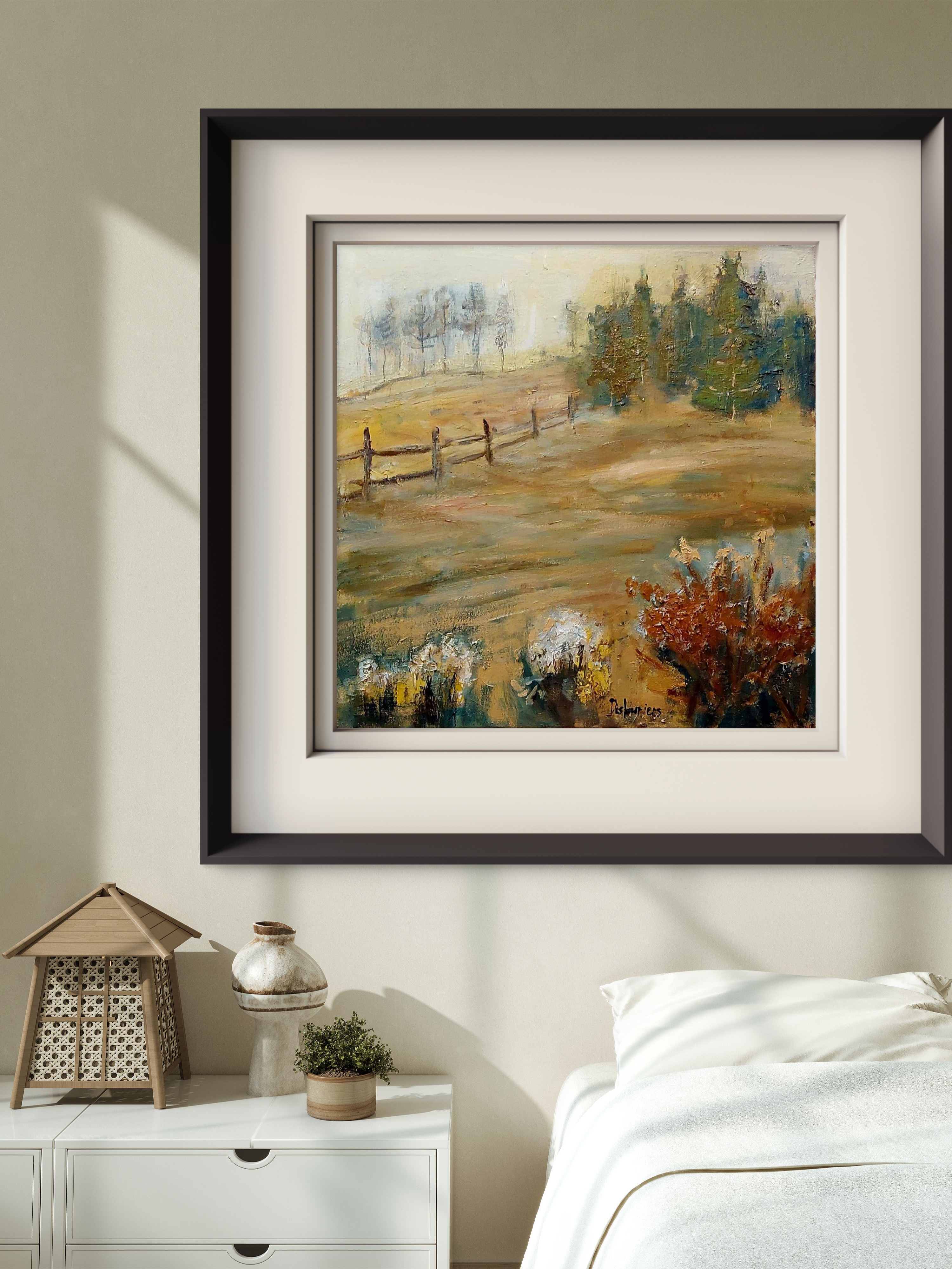 Paysage de campagne es Estrie au Québec avec un clôture rustique et un champ blond prêt pour la moisson